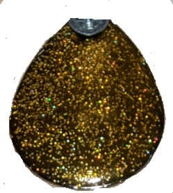 A gold colored glitter substance is shown.