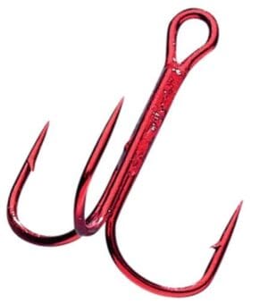 A red hook with three large hooks on it.
